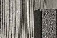 A close-up of the exterior concrete surface of the NAC.