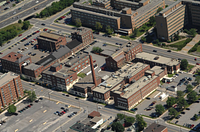 Aerial view, block designated for re-development, looking northwest.