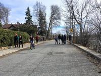 Cyclists and pedestrians share the road along Echo Drive. 