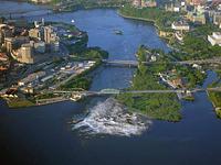 A visionary image of the sacred site with re-naturalized Chaudière Island and undammed waterfalls.